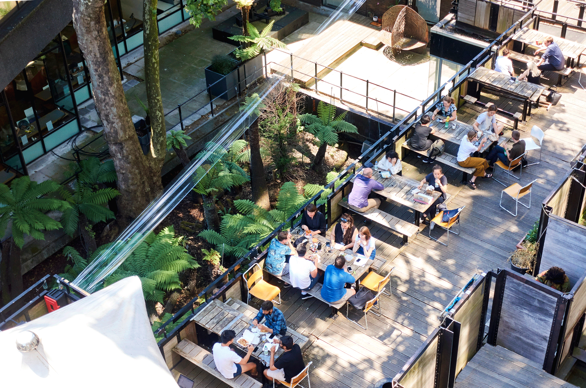 Three students collaboraring on a project
