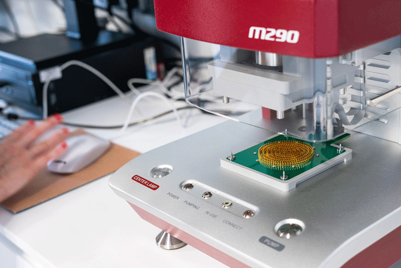 A sample slide under an m290 analyser machine